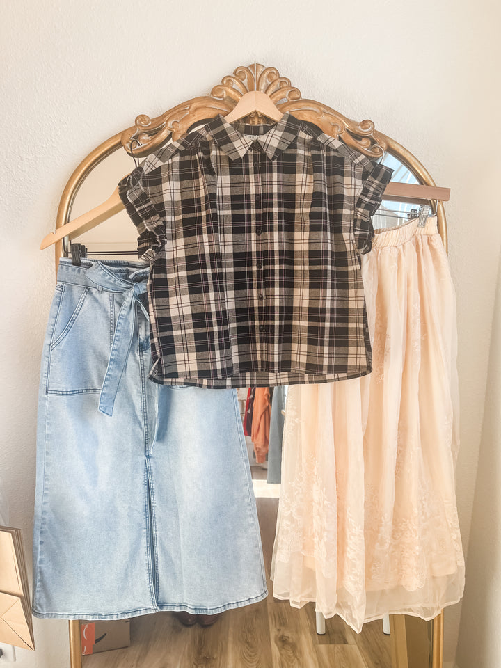 Plaid shirt, denim skirt, and beige skirt