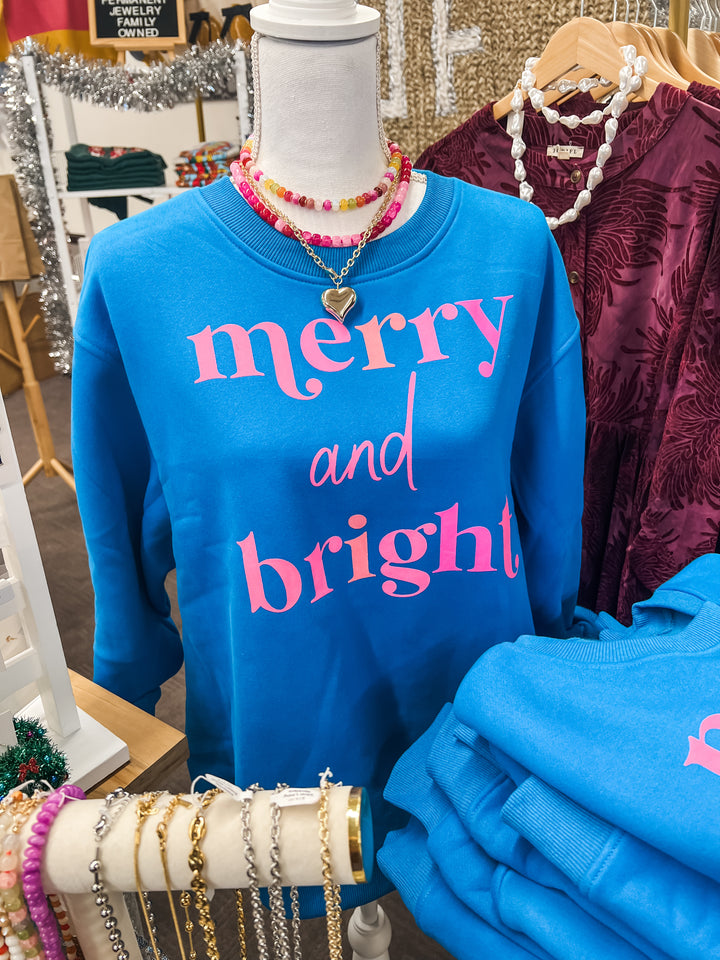 Blue sweatshirt with &