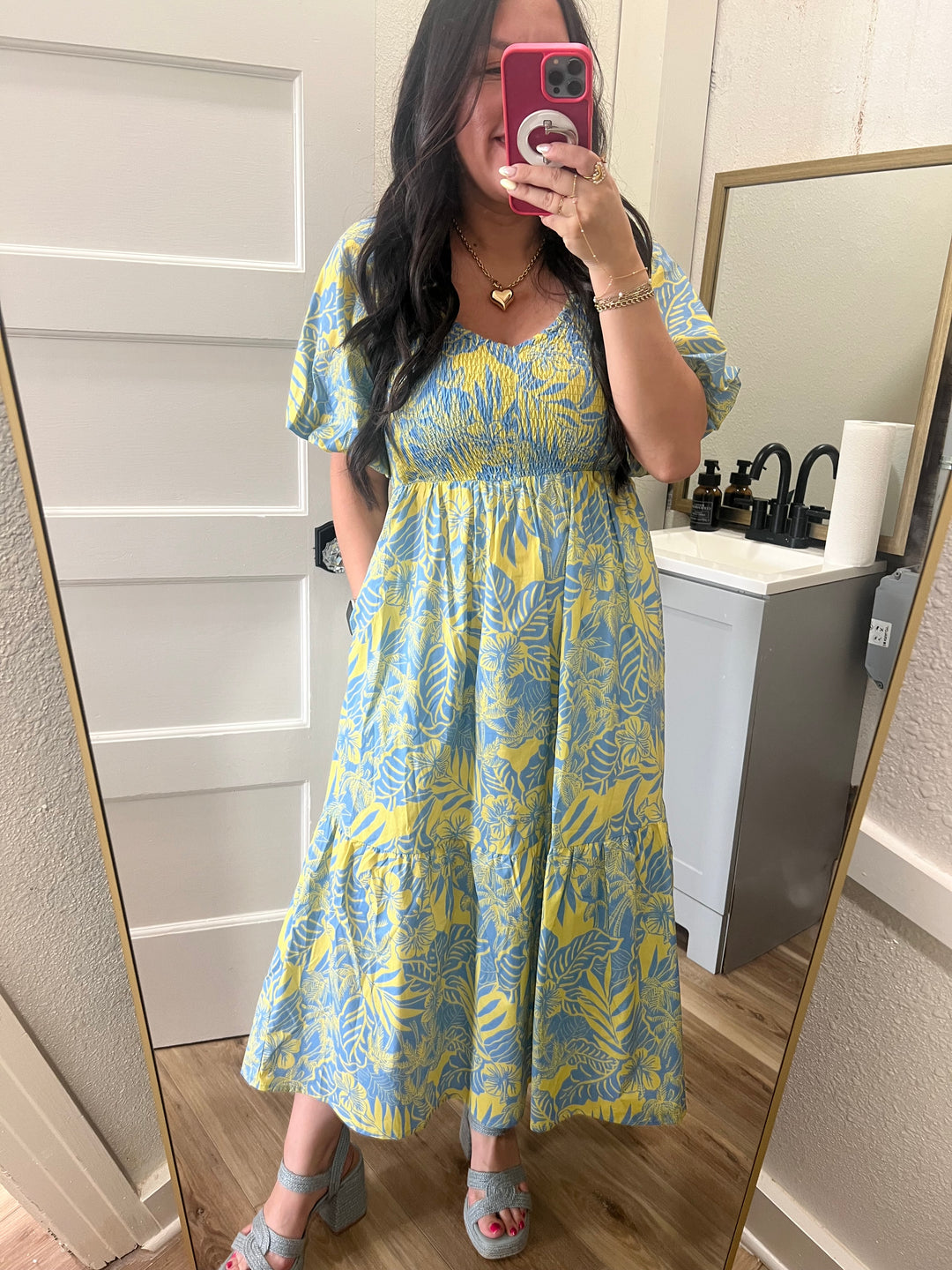 Woman taking a selfie in a blue and yellow cotton dress