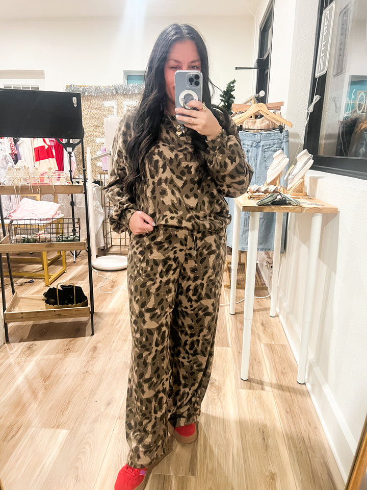 Woman wearing a leopard set