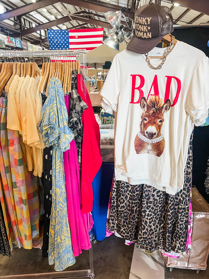 colorful garments and a prominent &