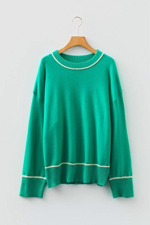 Green sweater with white trim 