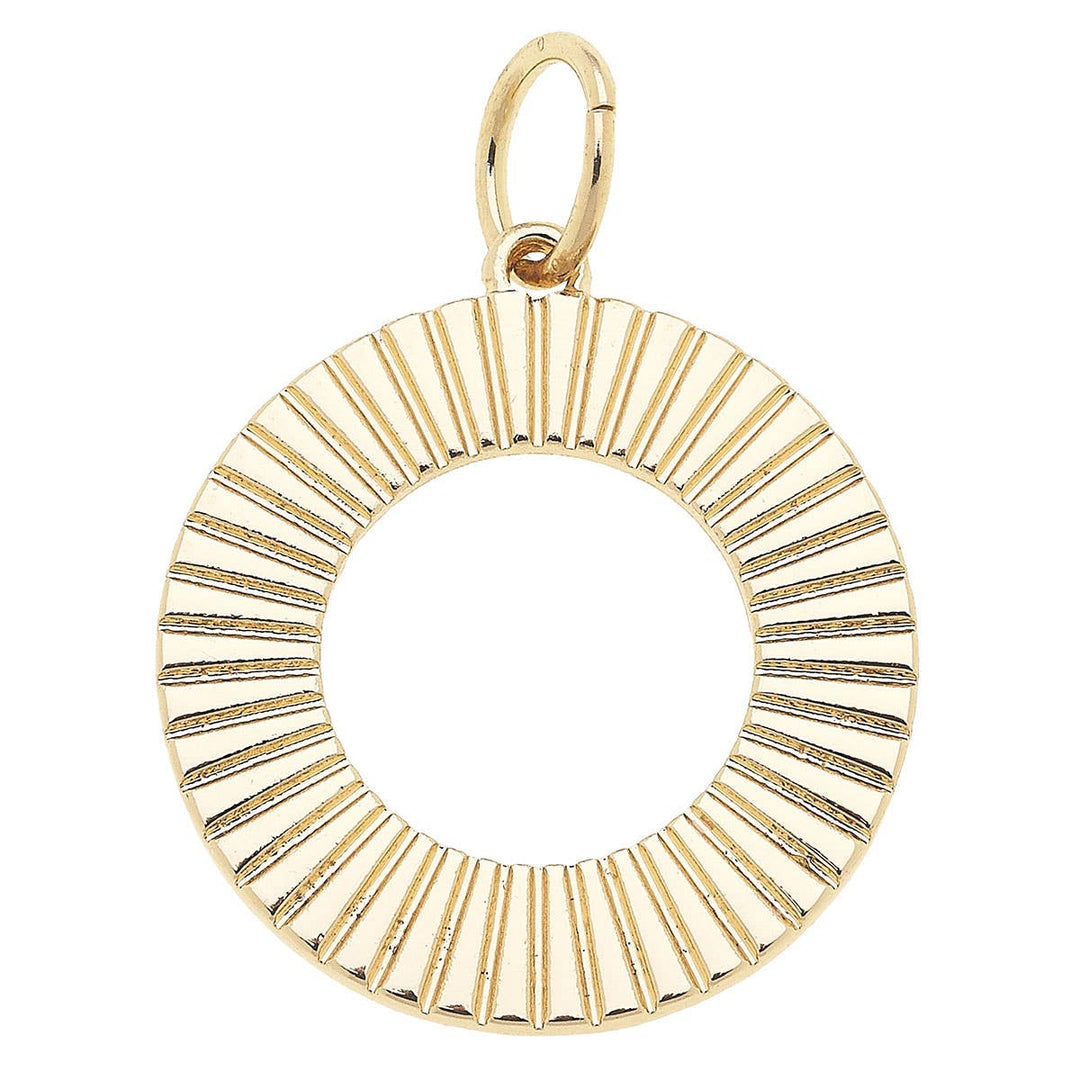 A shiny gold fluted metal disc charm with a textured design, suitable for adding to charm necklaces or bracelets.