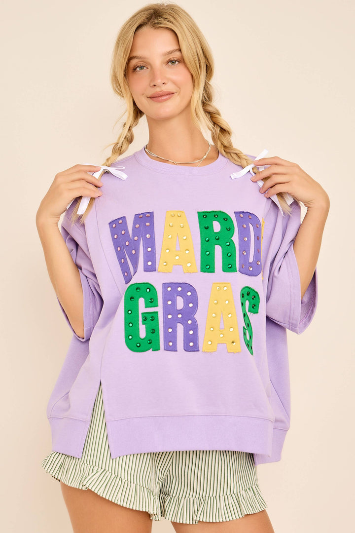 Woman wearing a purple &
