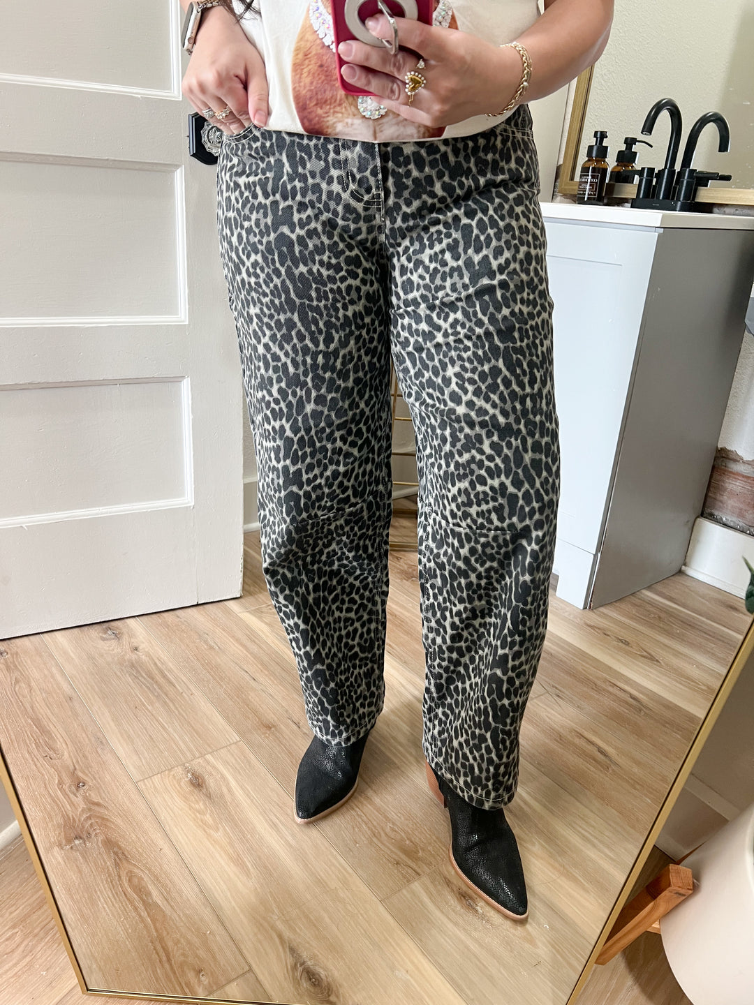 Woman wearing leopard print barrel pant