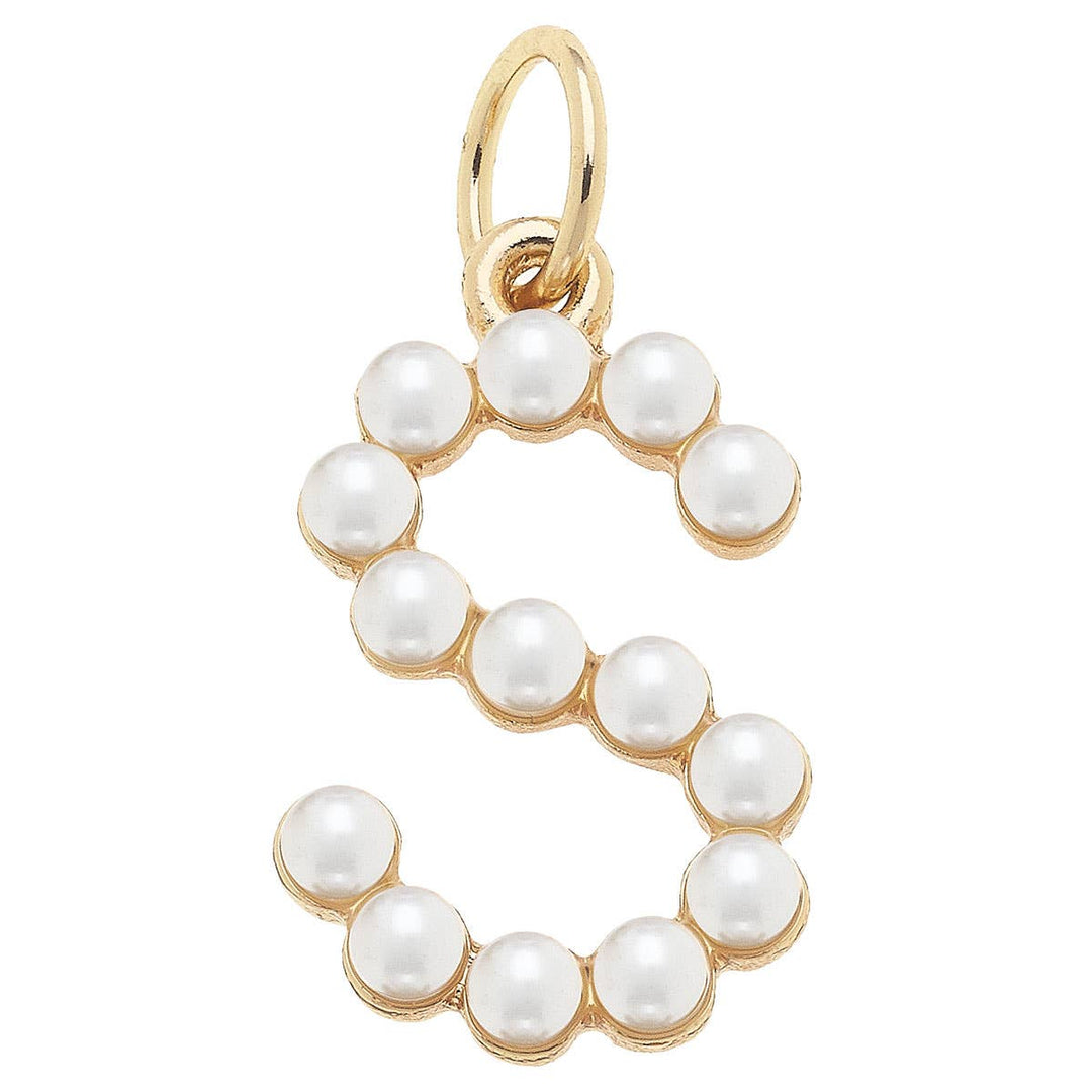 A gold-plated letter charm adorned with white pearls, shaped like the letter 'S'.
