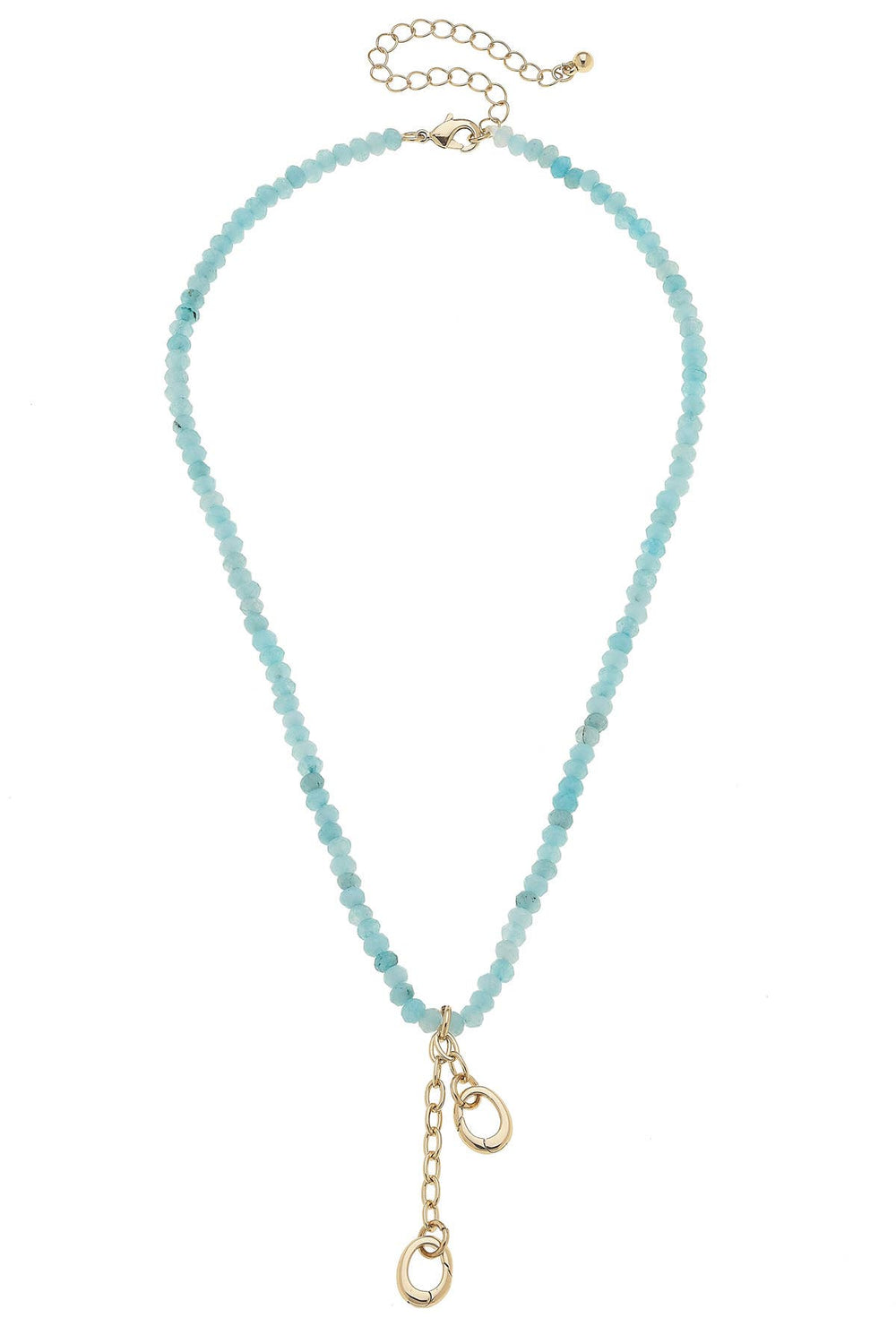 A turquoise gemstone necklace with attachments for charms