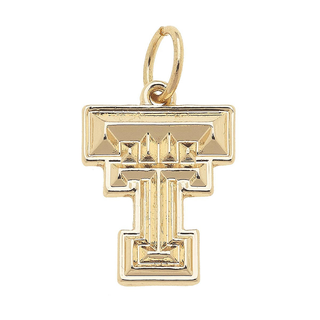 A shiny gold charm in the shape of the Texas Tech Red Raiders logo.