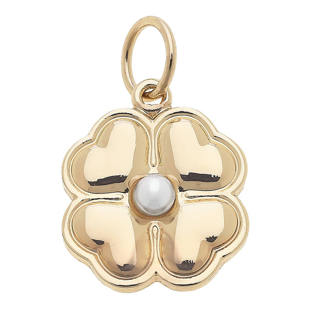 A heart-shaped clover charm in shiny gold with a pearl in the center, attached to a small gold chain.