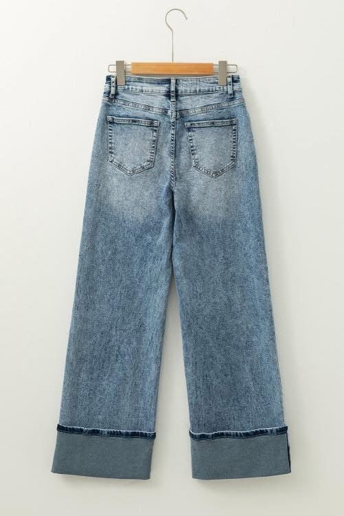 Back of blue wide leg jeans with cuffed hem