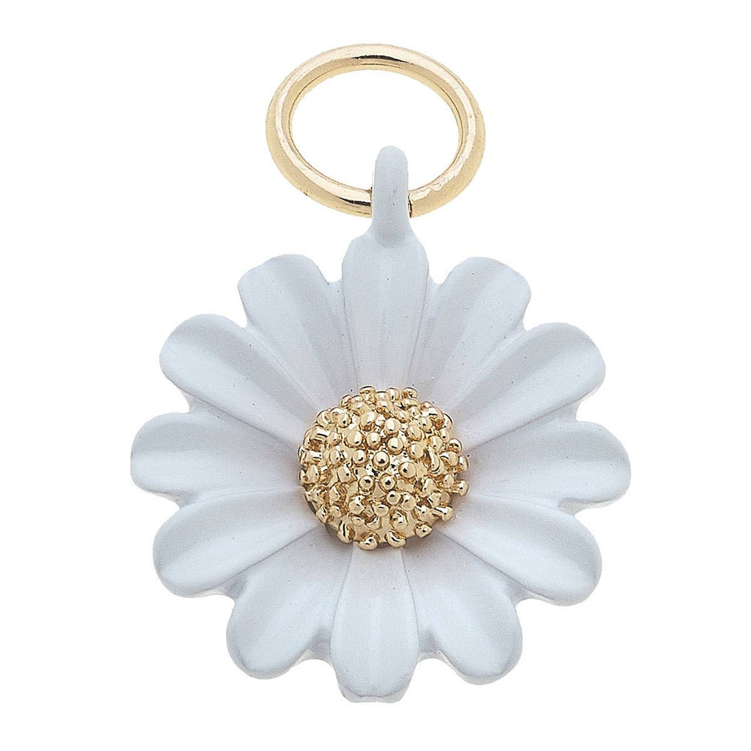 A white enamel daisy flower charm with a gold-plated center and yellow accents on the petals, attached to a small gold-plated ring.