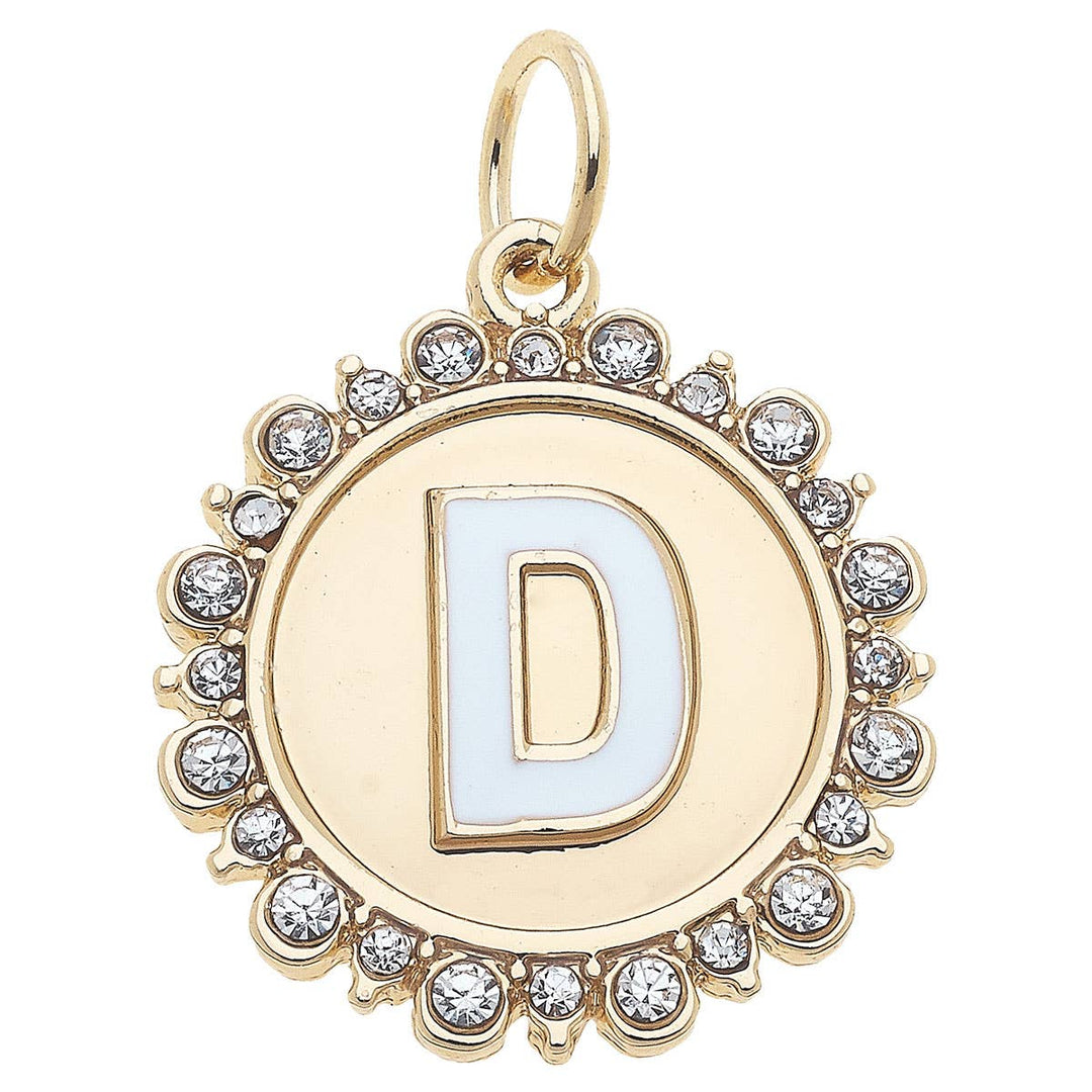 Gold pendant with letter 'D' and crystal accents on a white background