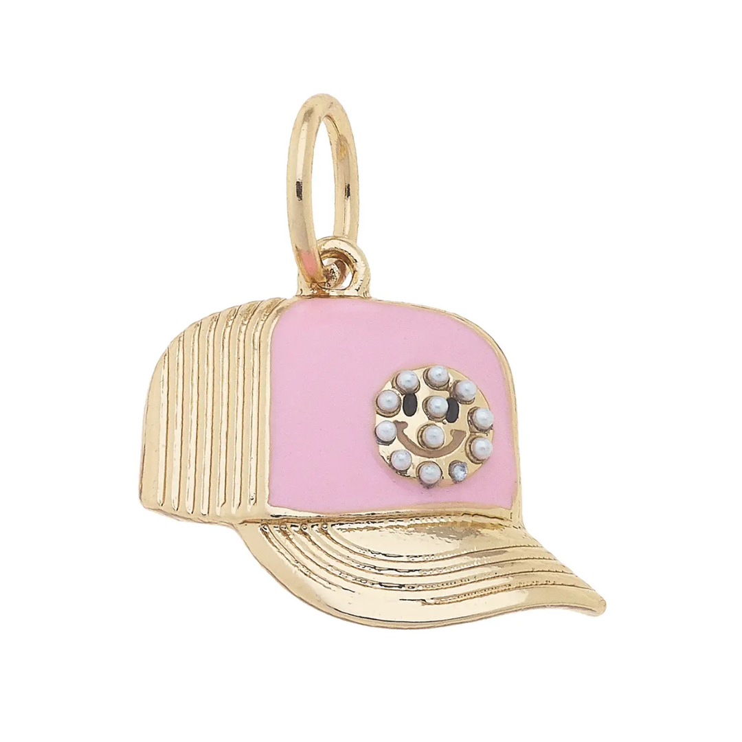 Trucker hat shaped charm with pink accents and a gold smiley face with pearl embellishments