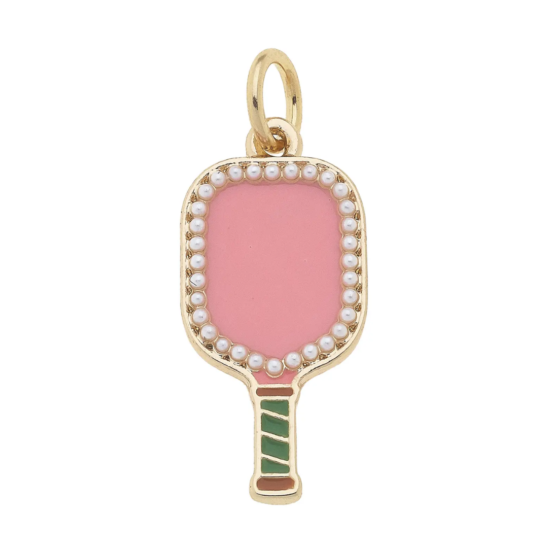 A gold-plated pickleball paddle charm with a pink body and pearl accents along the border.
