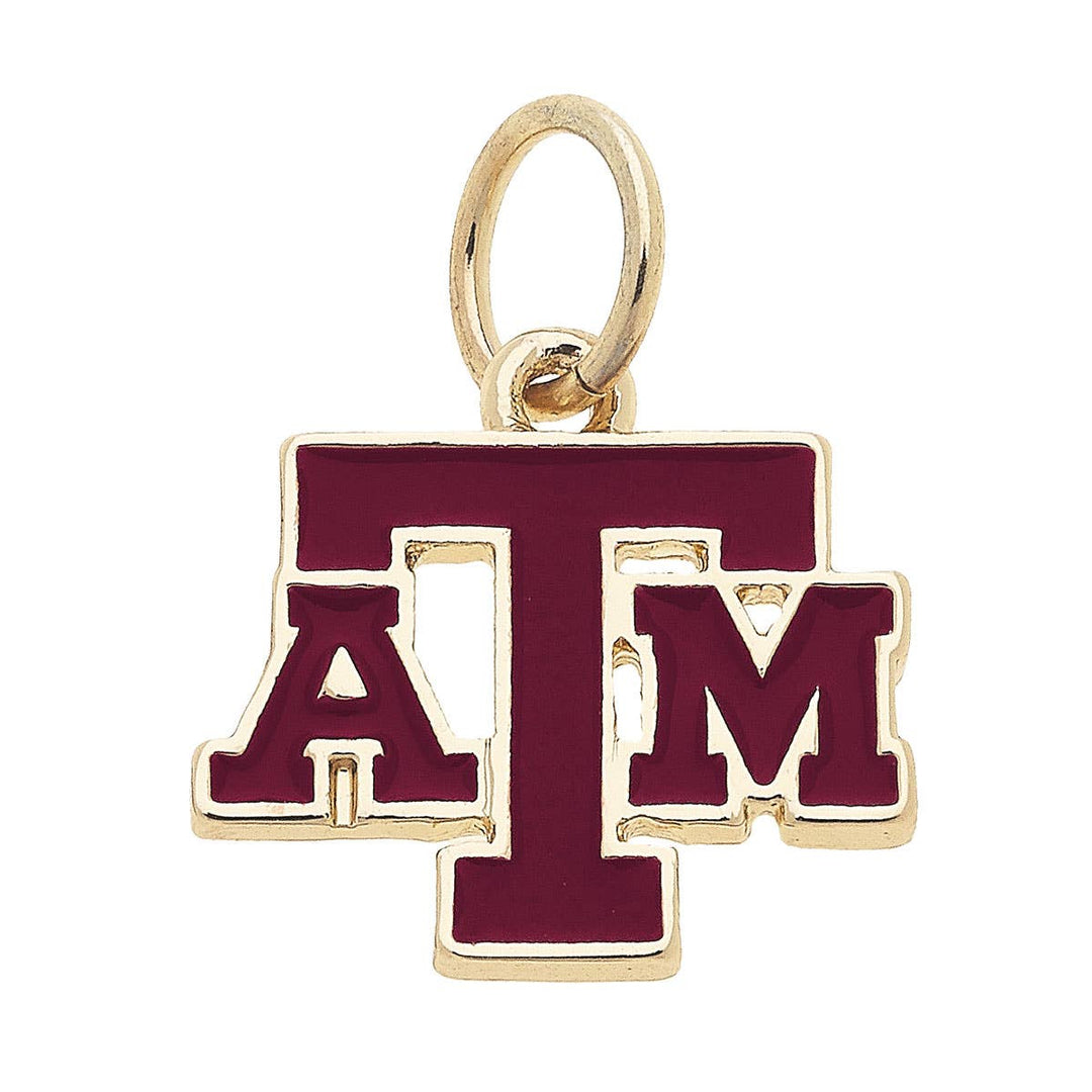 A gold-plated charm with the Texas A&amp;M Aggies logo in red and gold colors.
