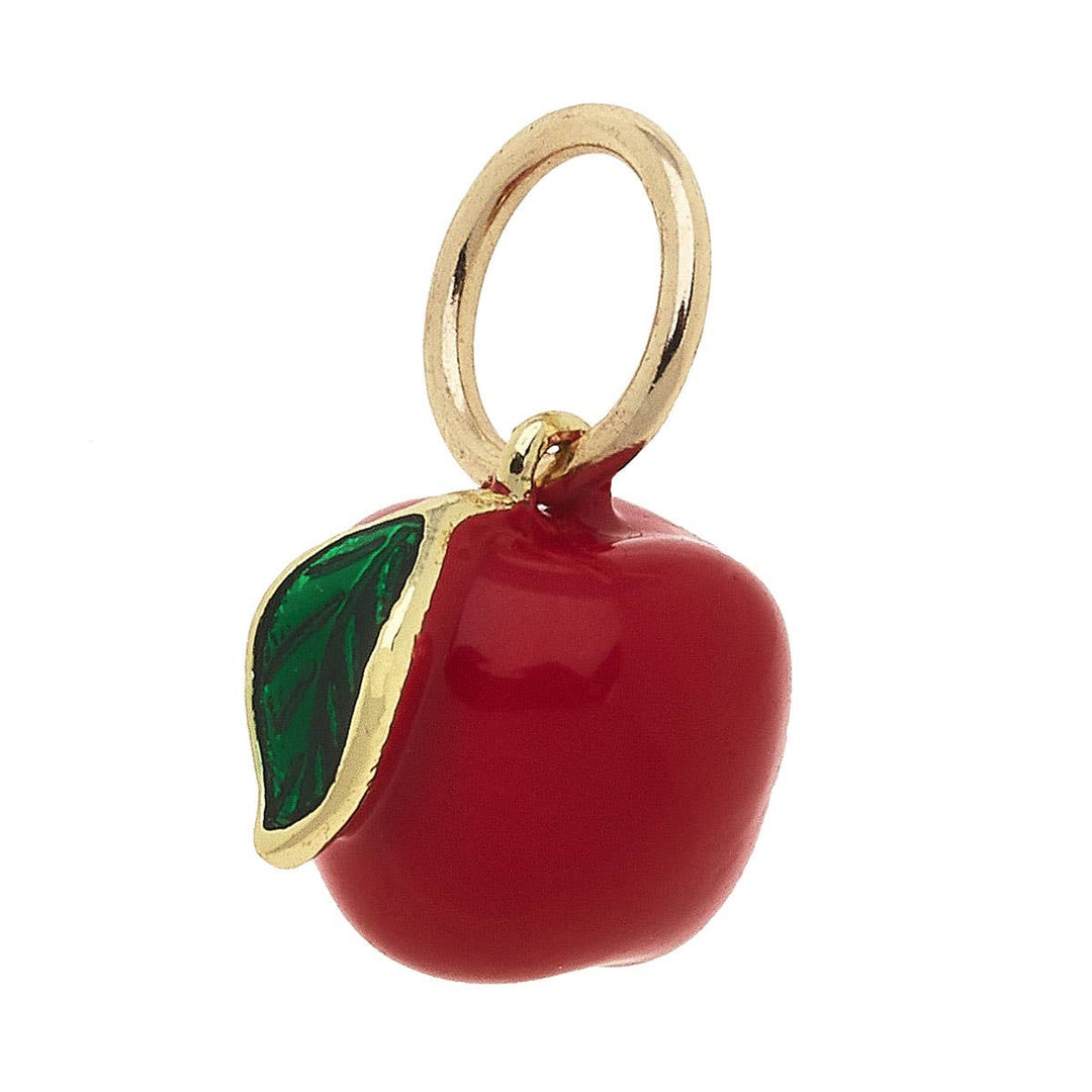A red enamel apple charm with a gold-plated loop and a green leaf detail on the top.