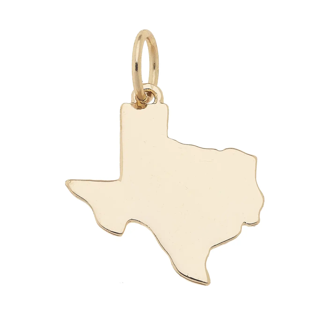 A shiny gold charms shaped like the state of Texas.