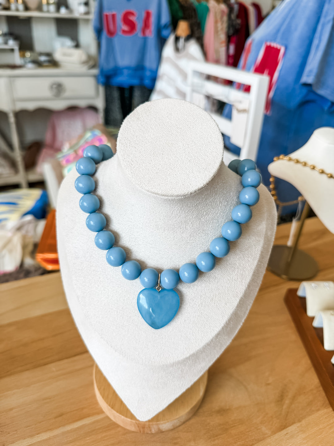 Chunky blue necklace with blue heart pendant