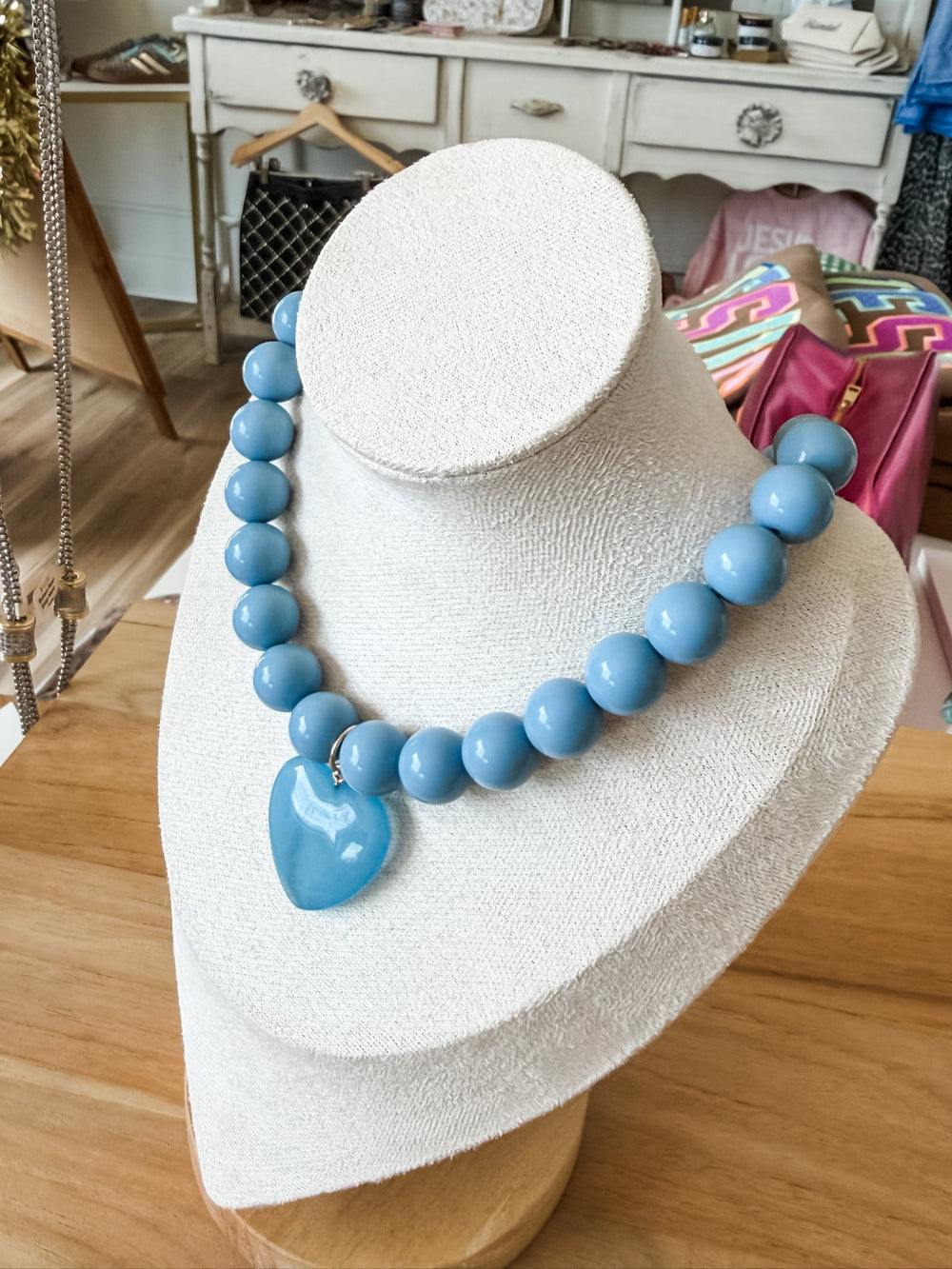 Chunky blue beaded necklace with blue heart pendant 