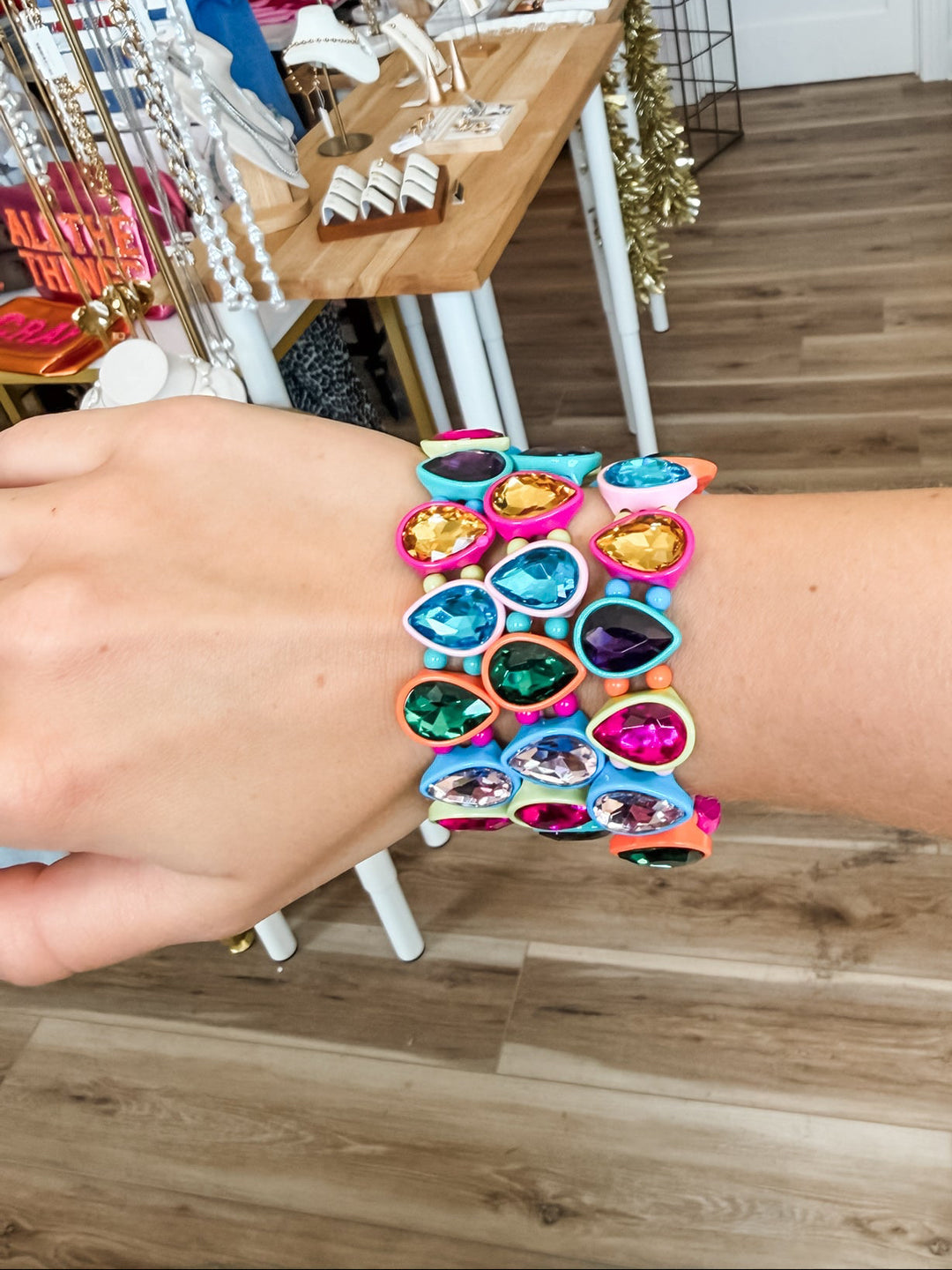 Three colorful elastic bracelets with teardrop jewels
