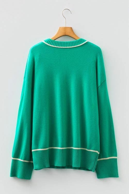 Green sweater with white accent