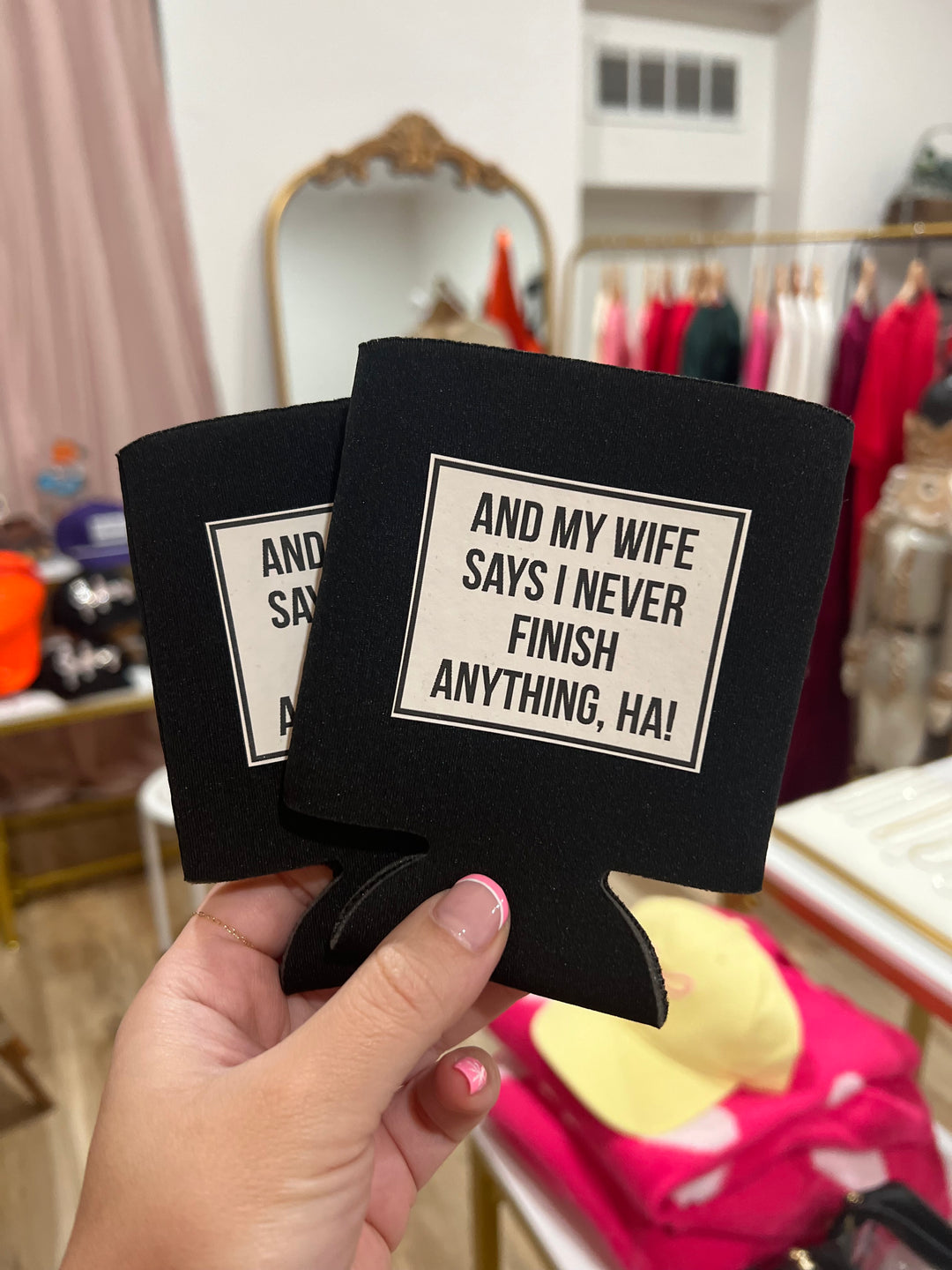 Black Koozie with text "And my wife says I never finish anything, HA!"