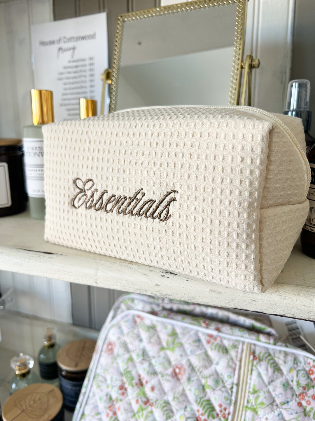 Beige toiletry bag with &