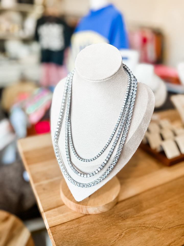 Layered 16, 18 and 20 silver tennis necklaces 