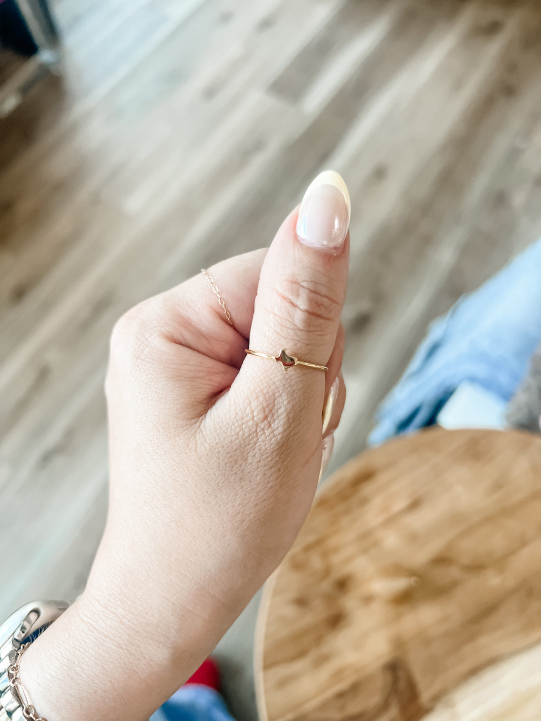 Gold thin band ring with a mini Texas map detail