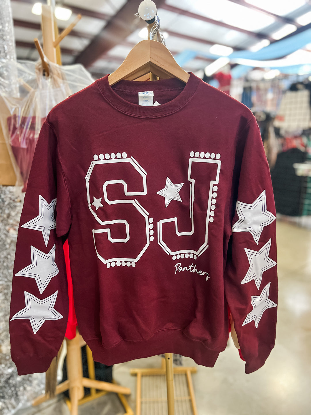 Maroon sweatshirt with &