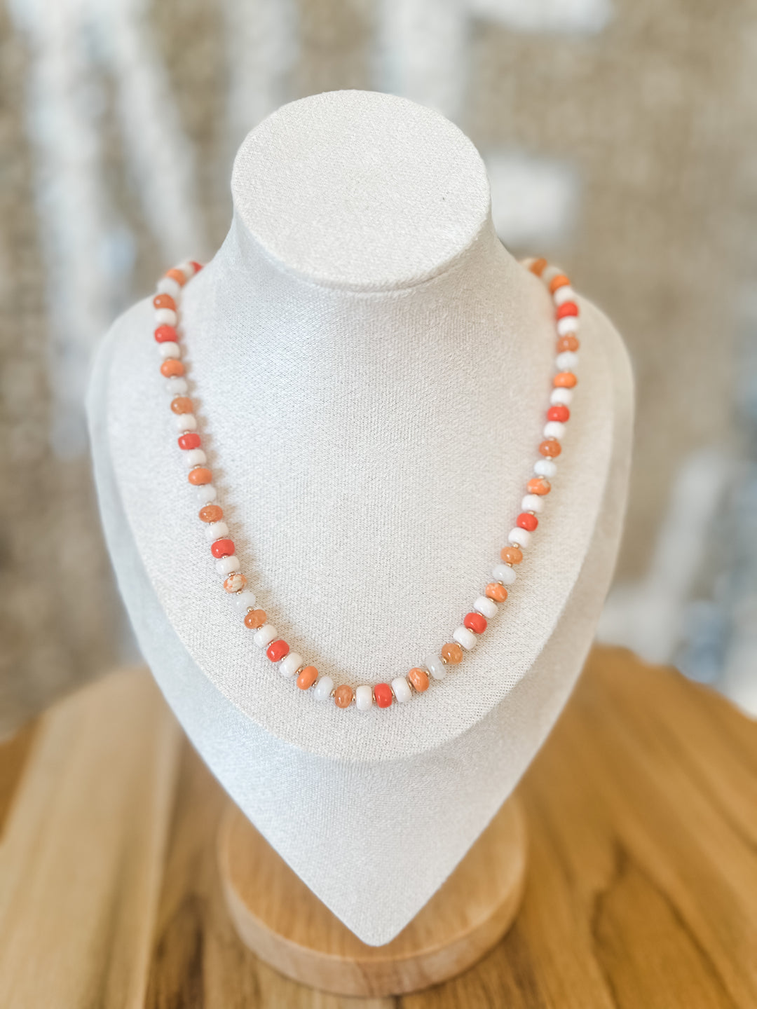Orange and white beaded necklace