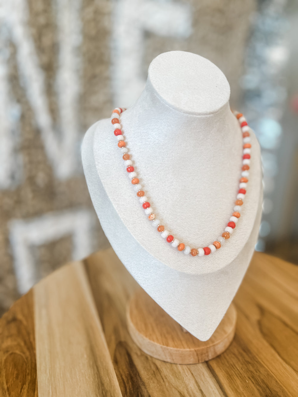 Orange and white beaded necklace