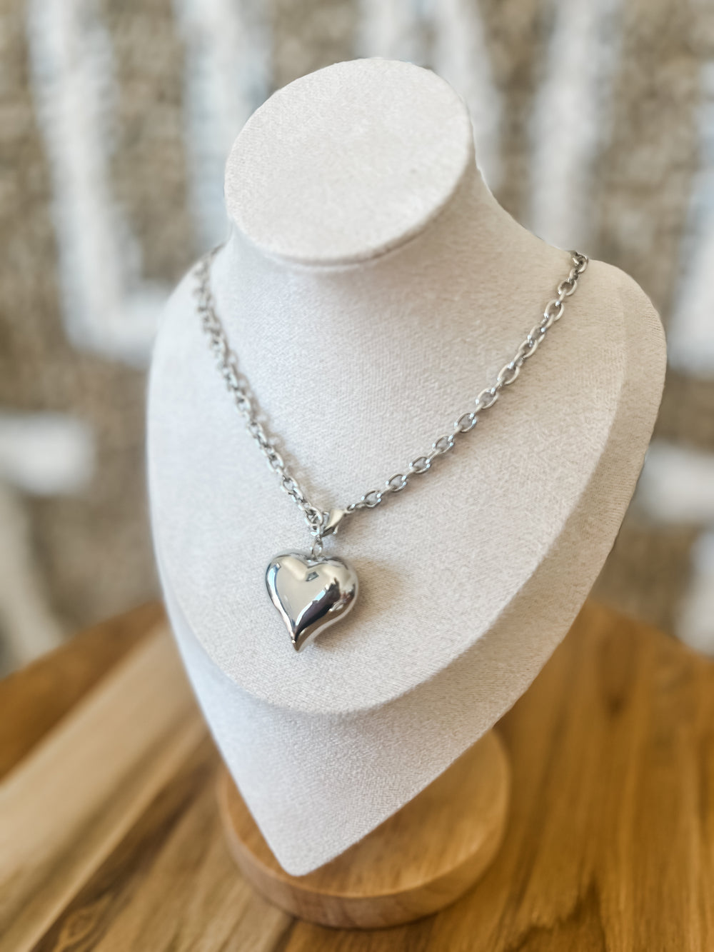 Silver heart-shaped pendant necklace