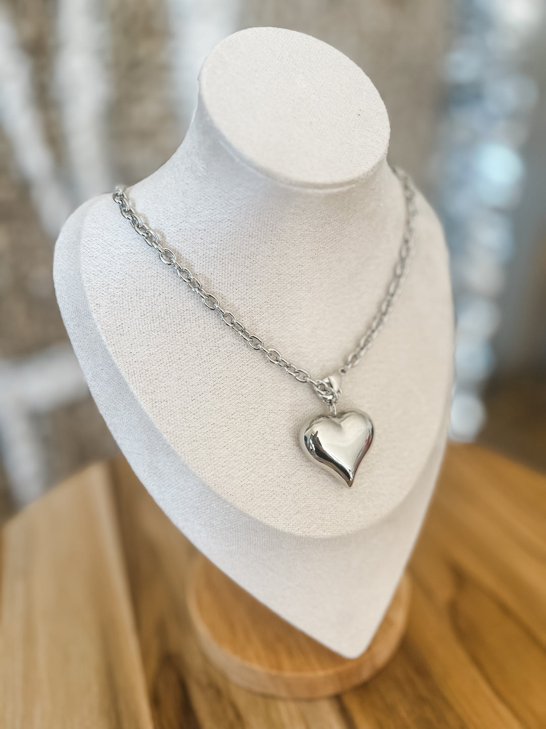 Silver heart-shaped pendant necklace 