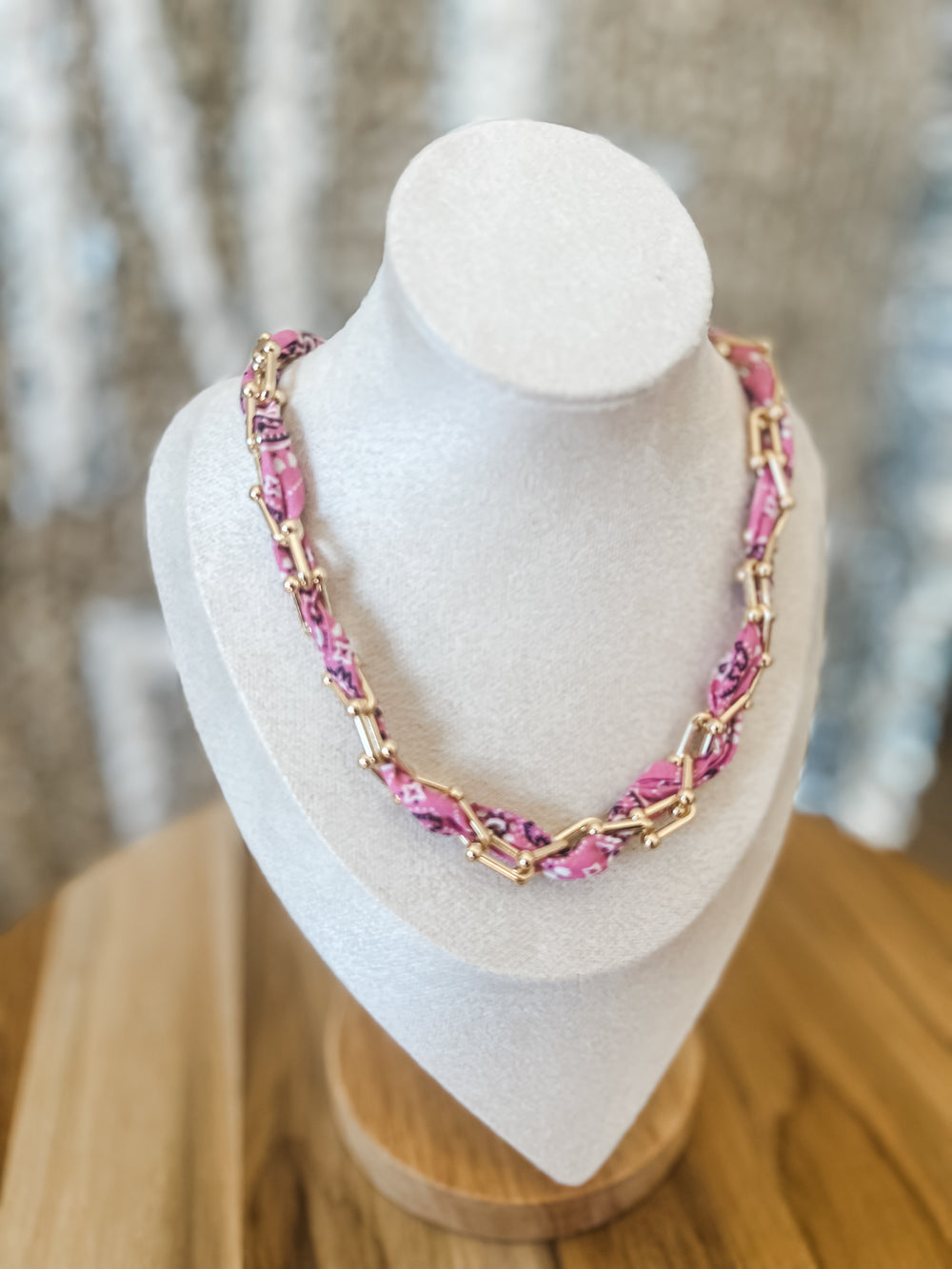 Pink bandana necklace woven into gold chain