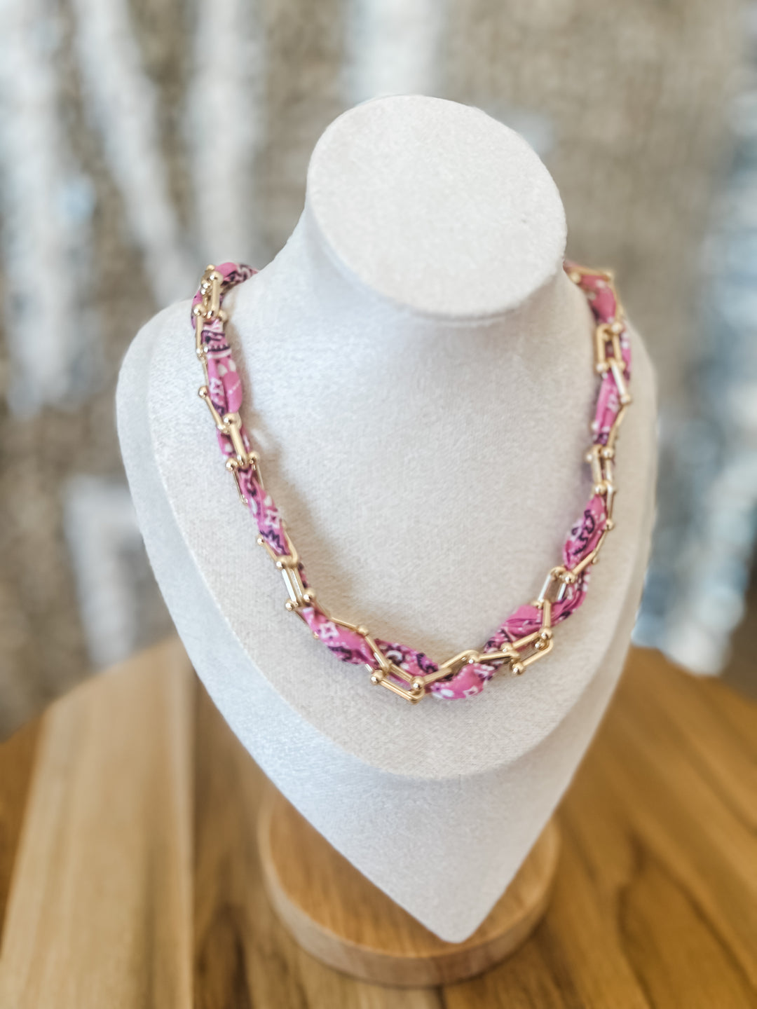 Pink bandana necklace woven into gold chain