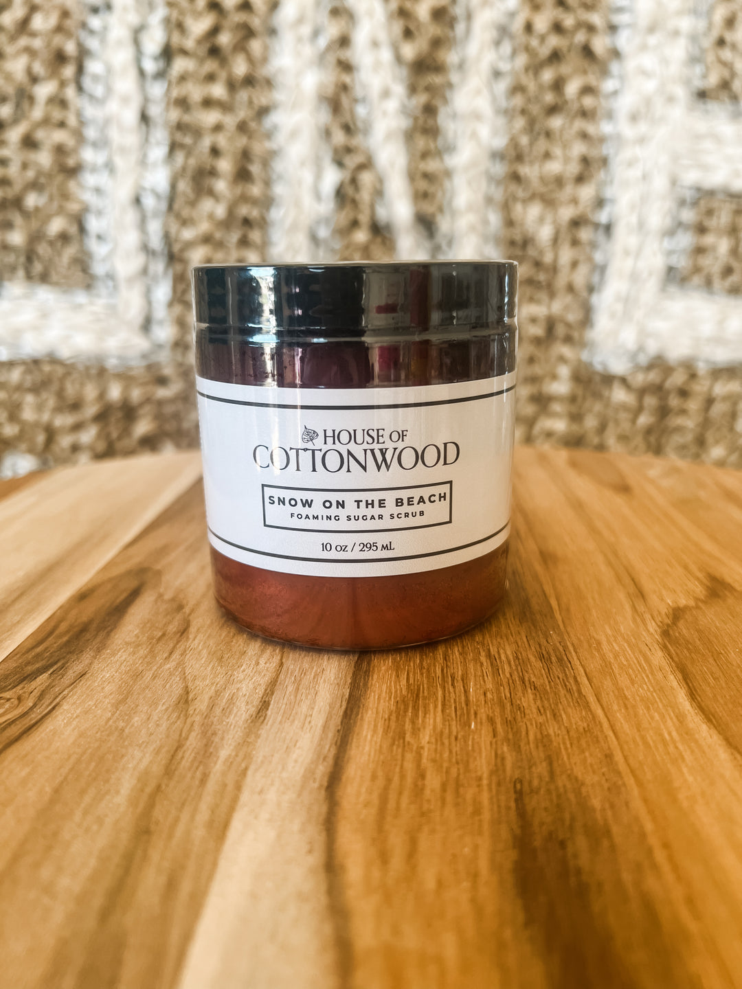Jar of body scrub on &