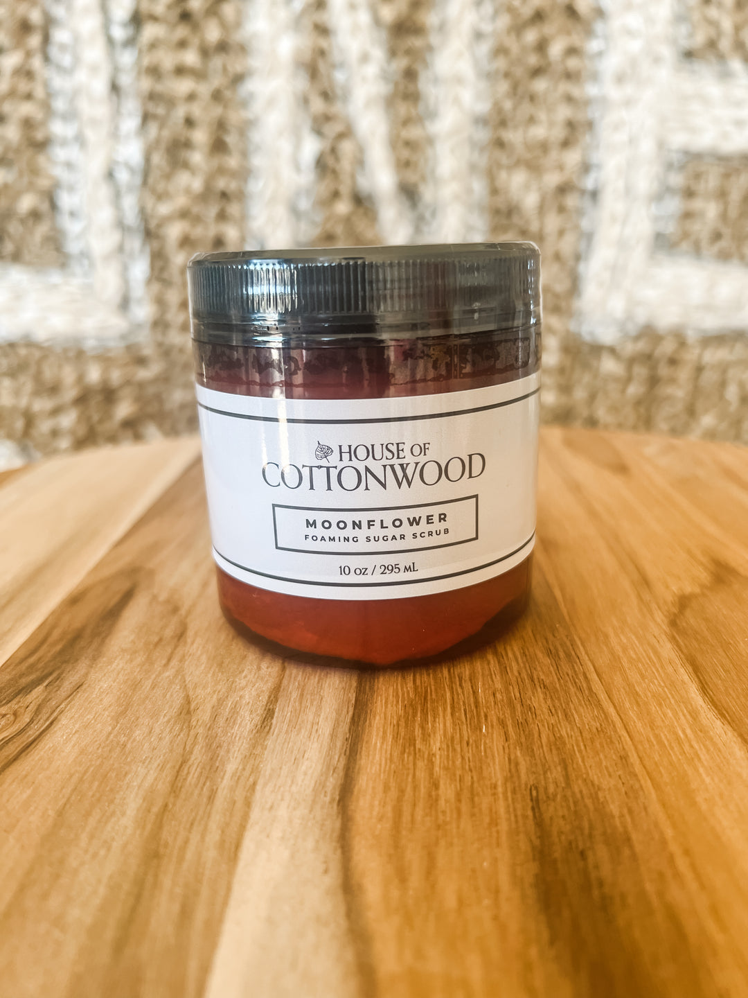 Jar of 'House of Cottonwood' sugar scrub product
