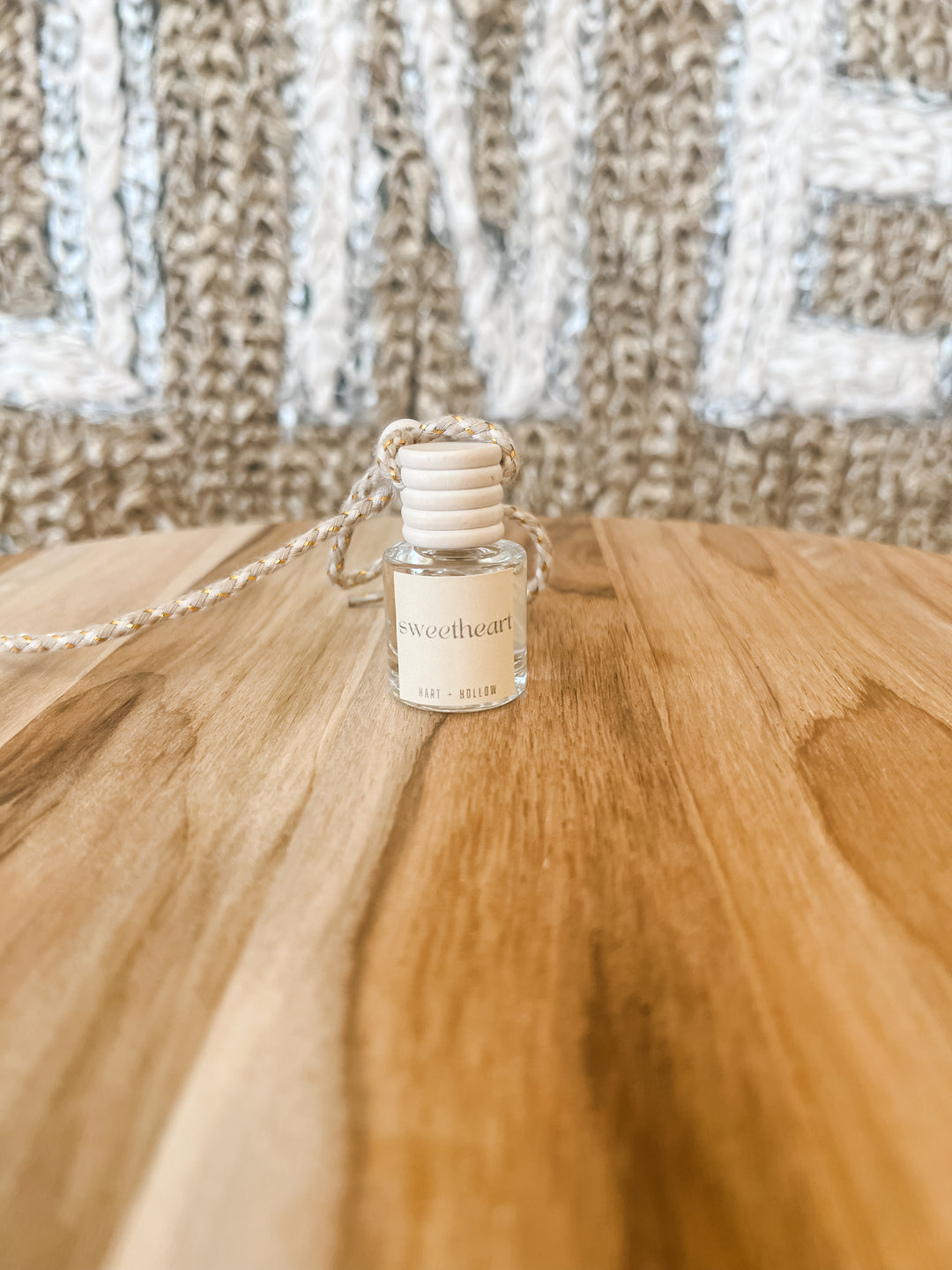small bottle of car or air scent labeled &