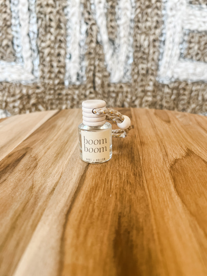 Small bottle of car or room air freshner labeled &