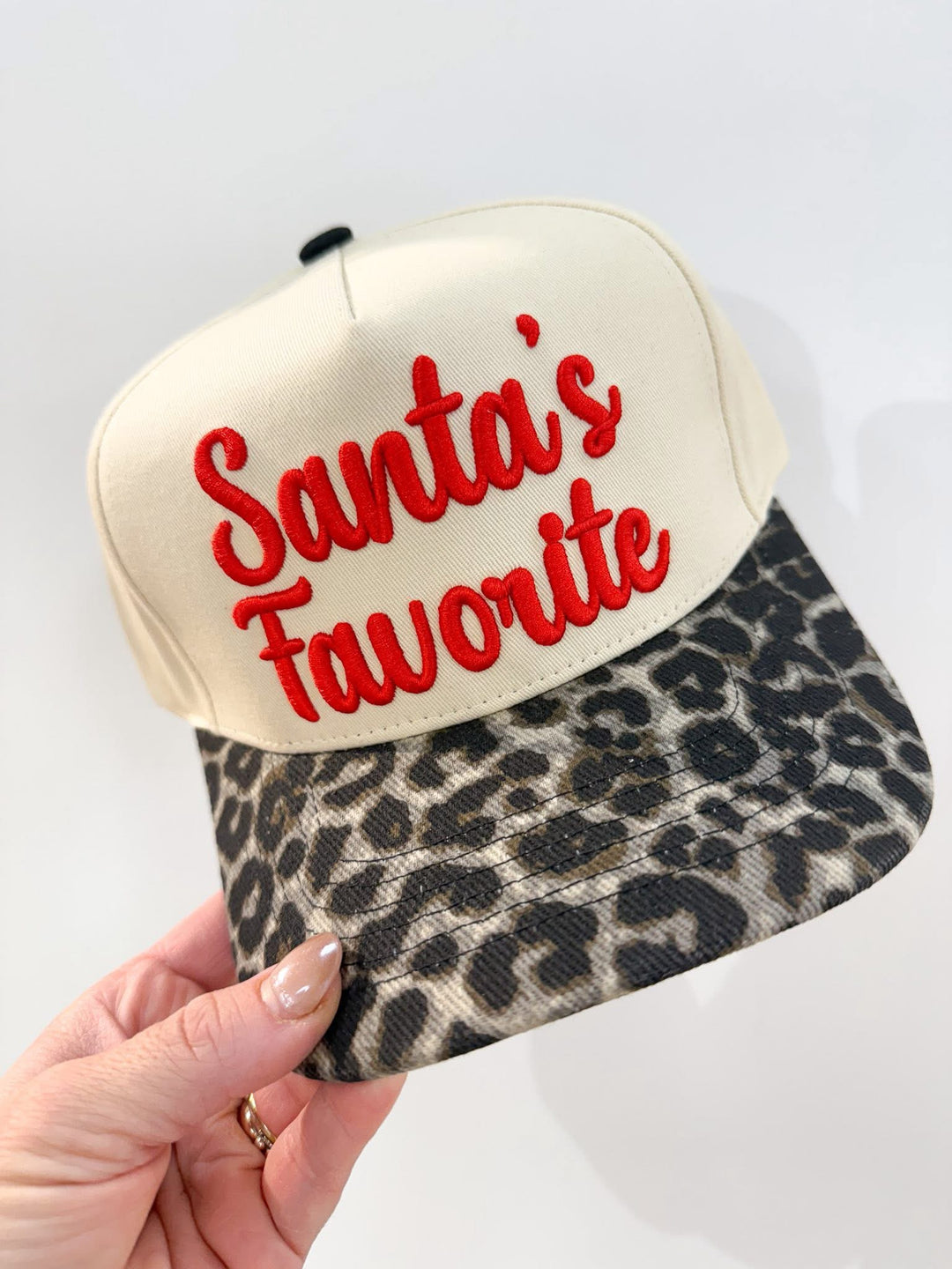 Cap with 'Santa's Favorite' text on a white background
