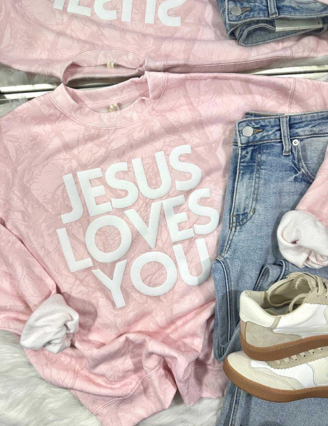 Pink sweatshirt with &
