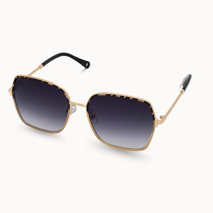 Gold-framed sunglasses with black gradient lenses 
