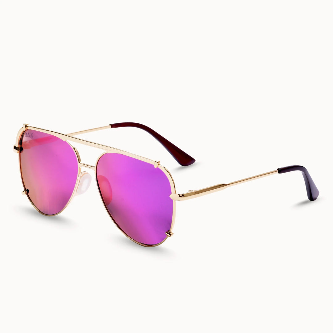 Sunglasses with pink lenses and gold frames 