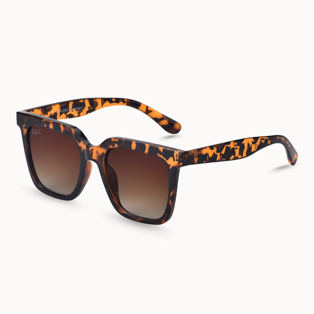 Sunglasses with tortoise shell frame and brown gradient lenses