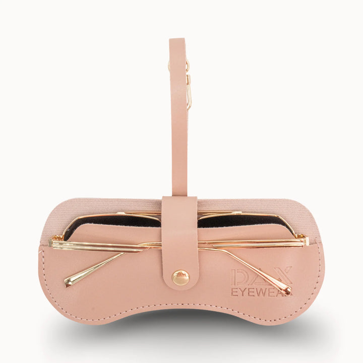 Pink eyewear case with gold accents on a white background