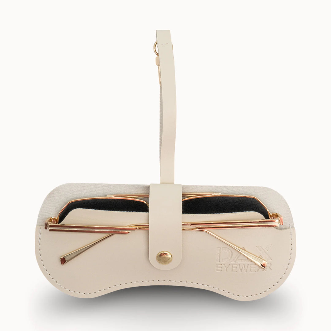 Cream-colored eyewear case with gold accents