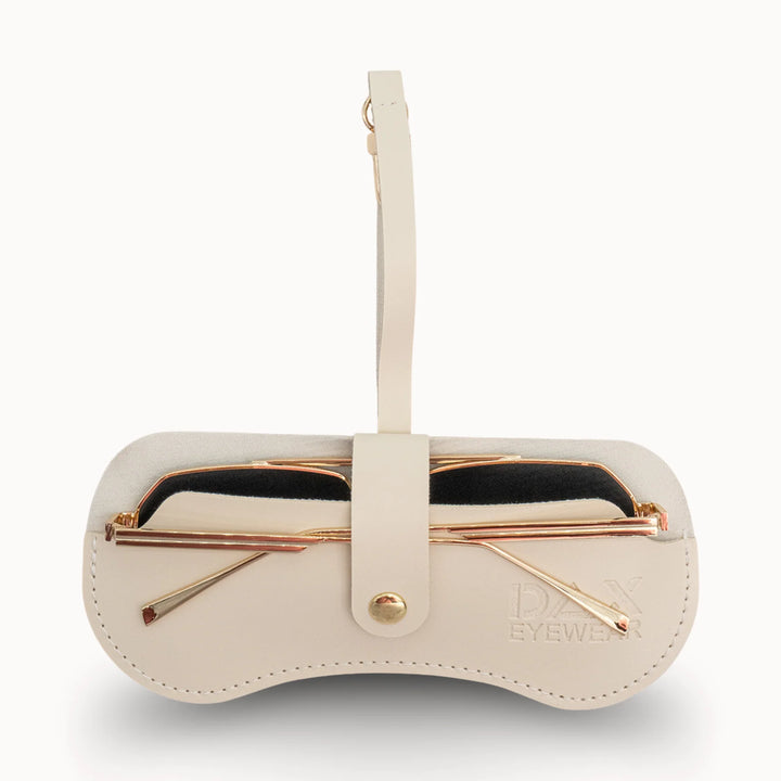 Cream-colored eyewear case with gold accents