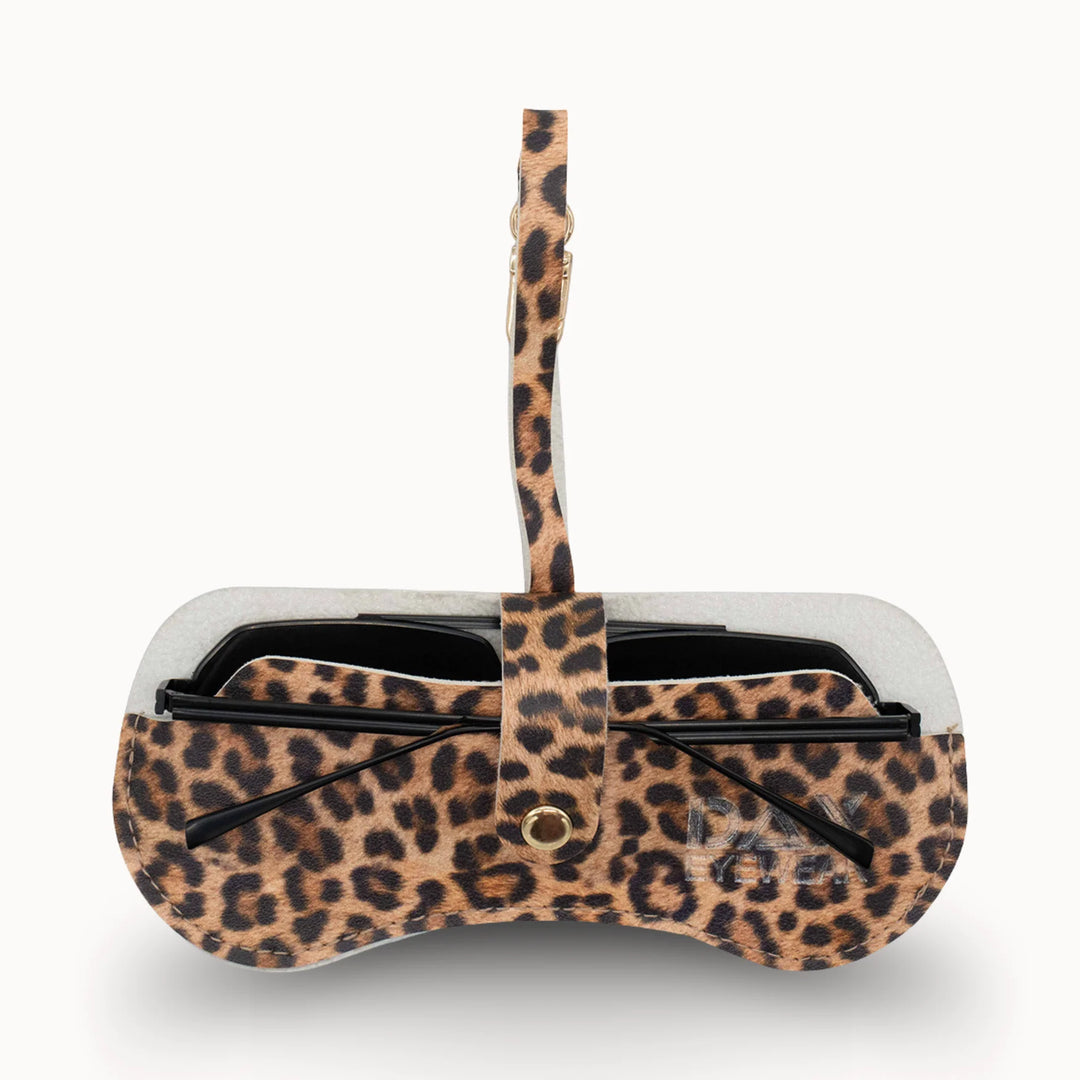 Leopard print eyewear case with a strap on a white background
