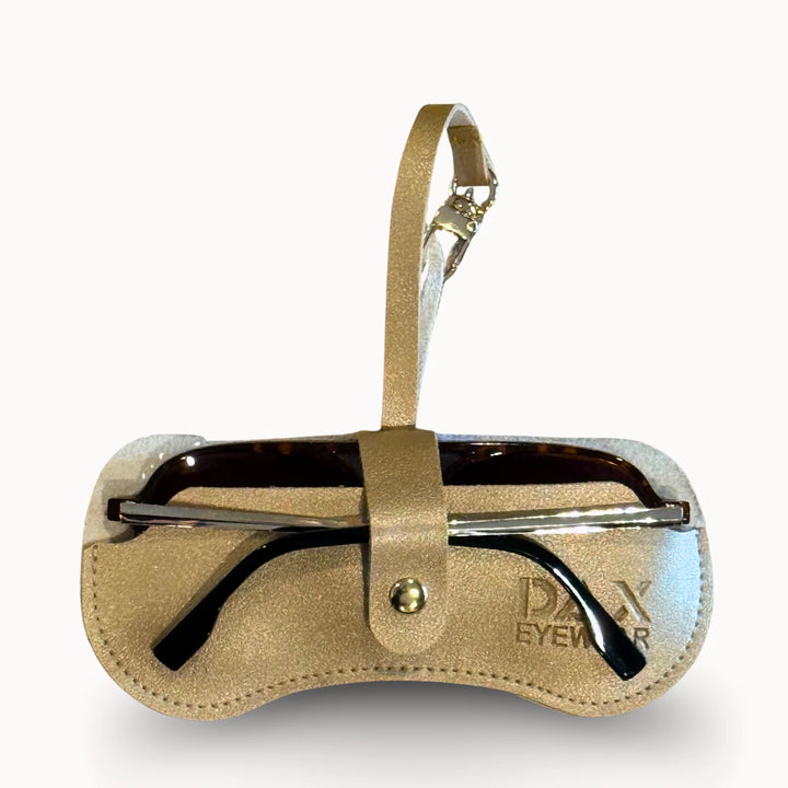 Sunglasses in gold eyewear case